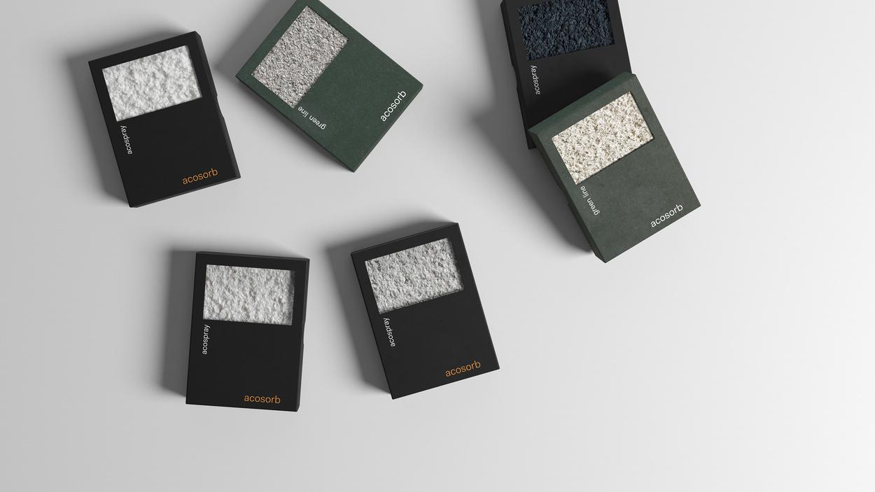 Assorted Acosorb acoustic solution product samples on display