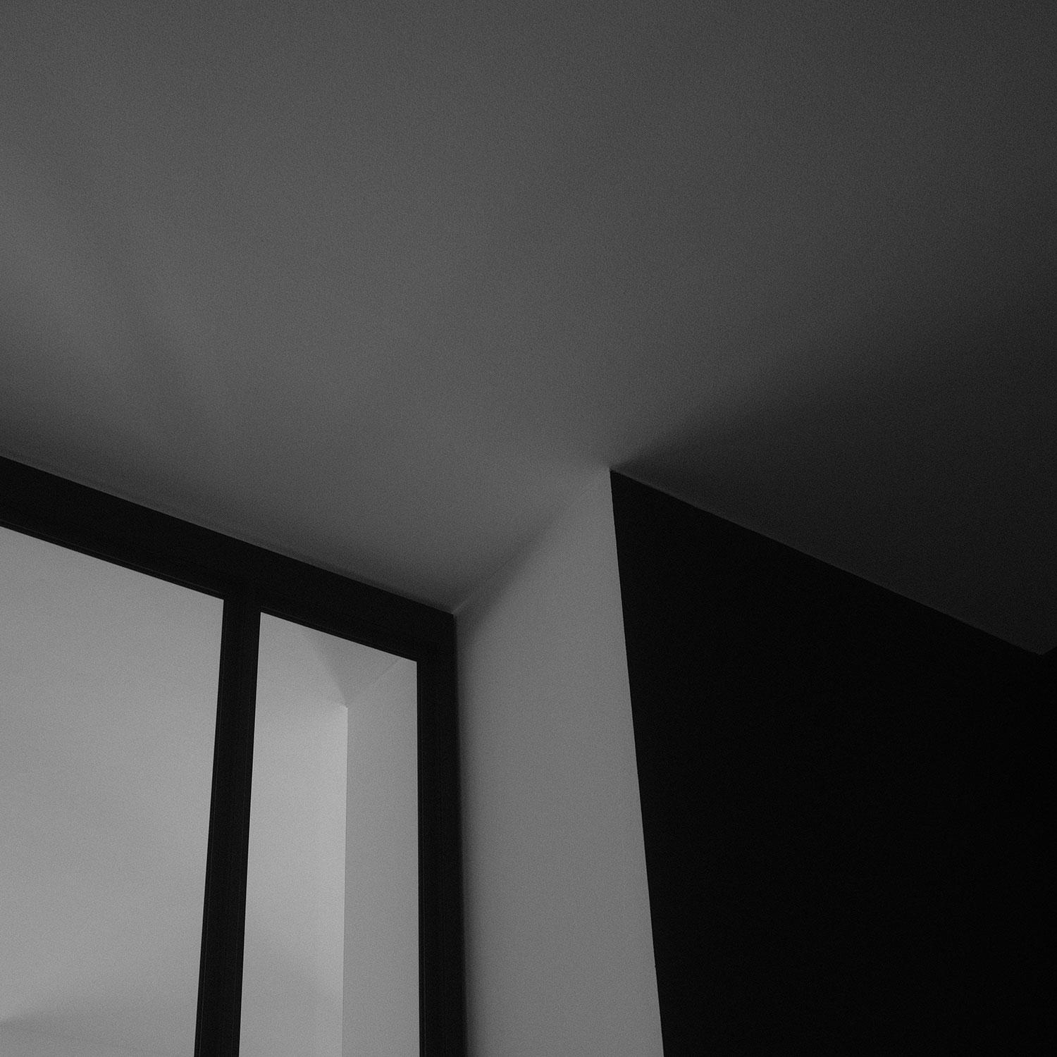 Acosorb acoustic ceiling in a modern interior with large windows