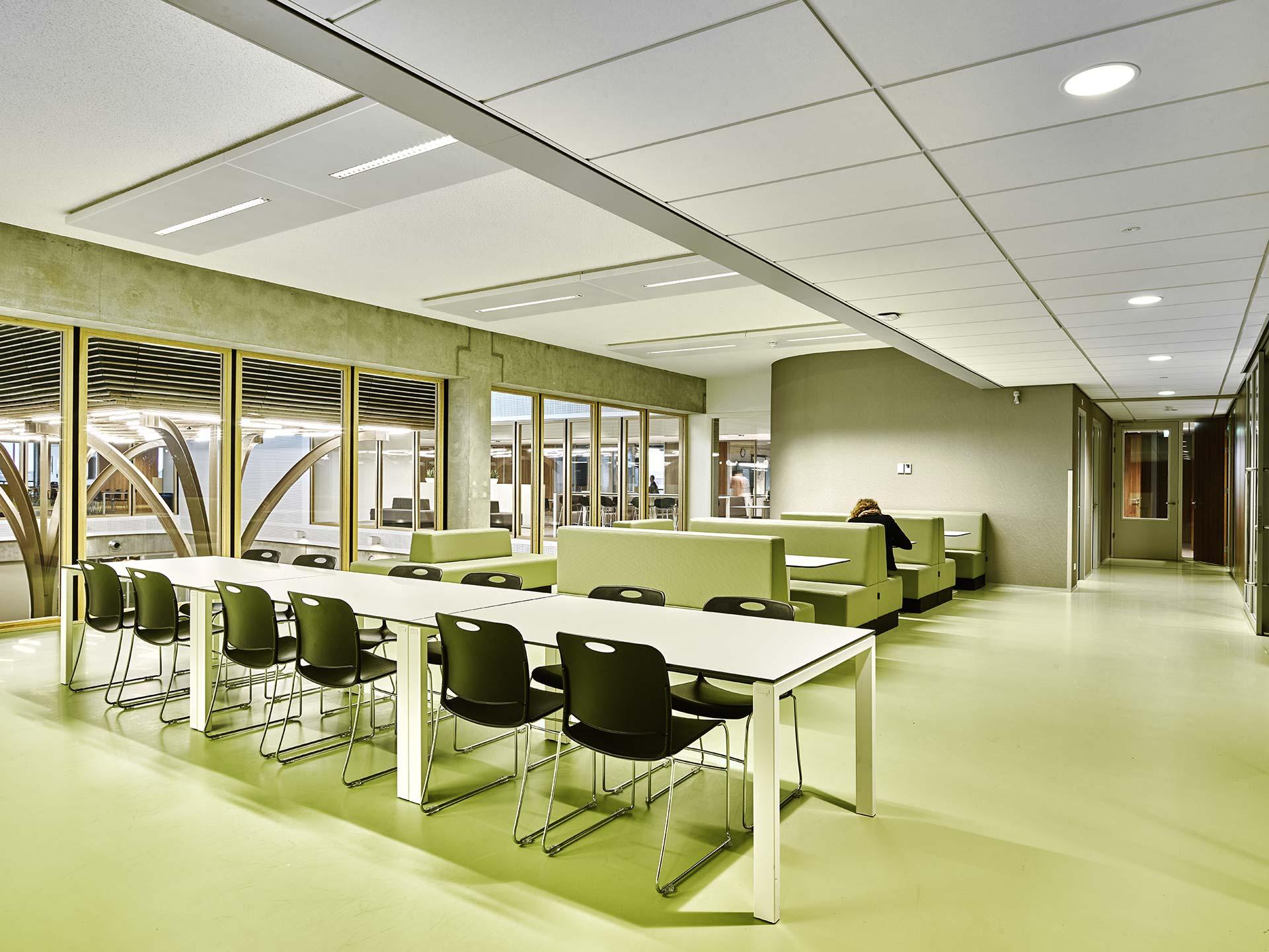 Interior of Melanchthon school cafeteria with tables and chairs
