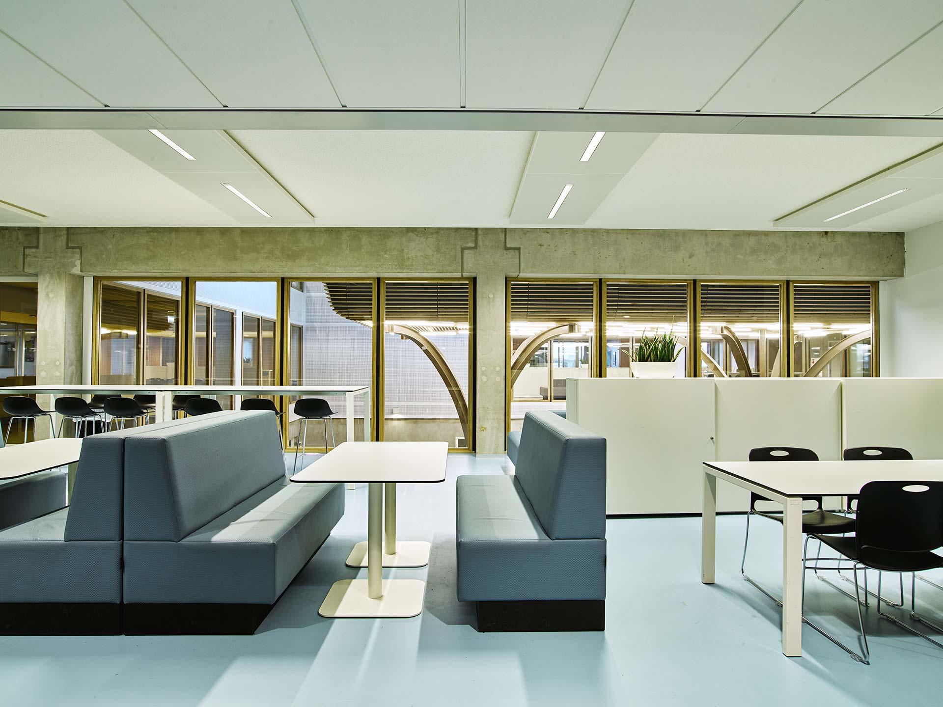 Modern lounge area at Melanchthon school with sofas and tables